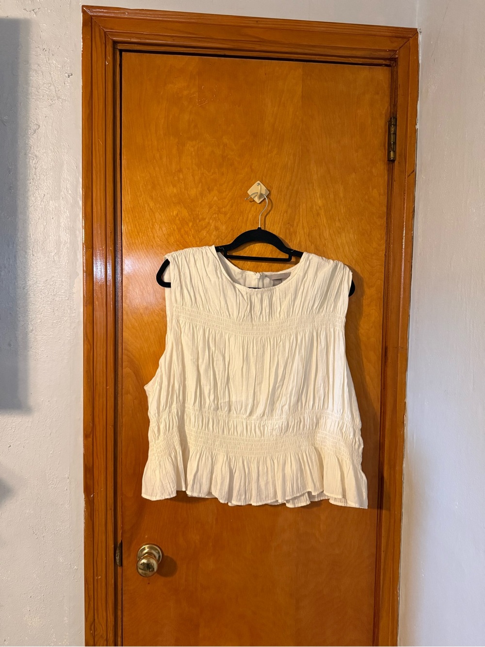 H&M Cream Sleeveless Smocked Peplum Top
